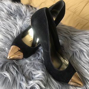 Black suede heels with gold toe